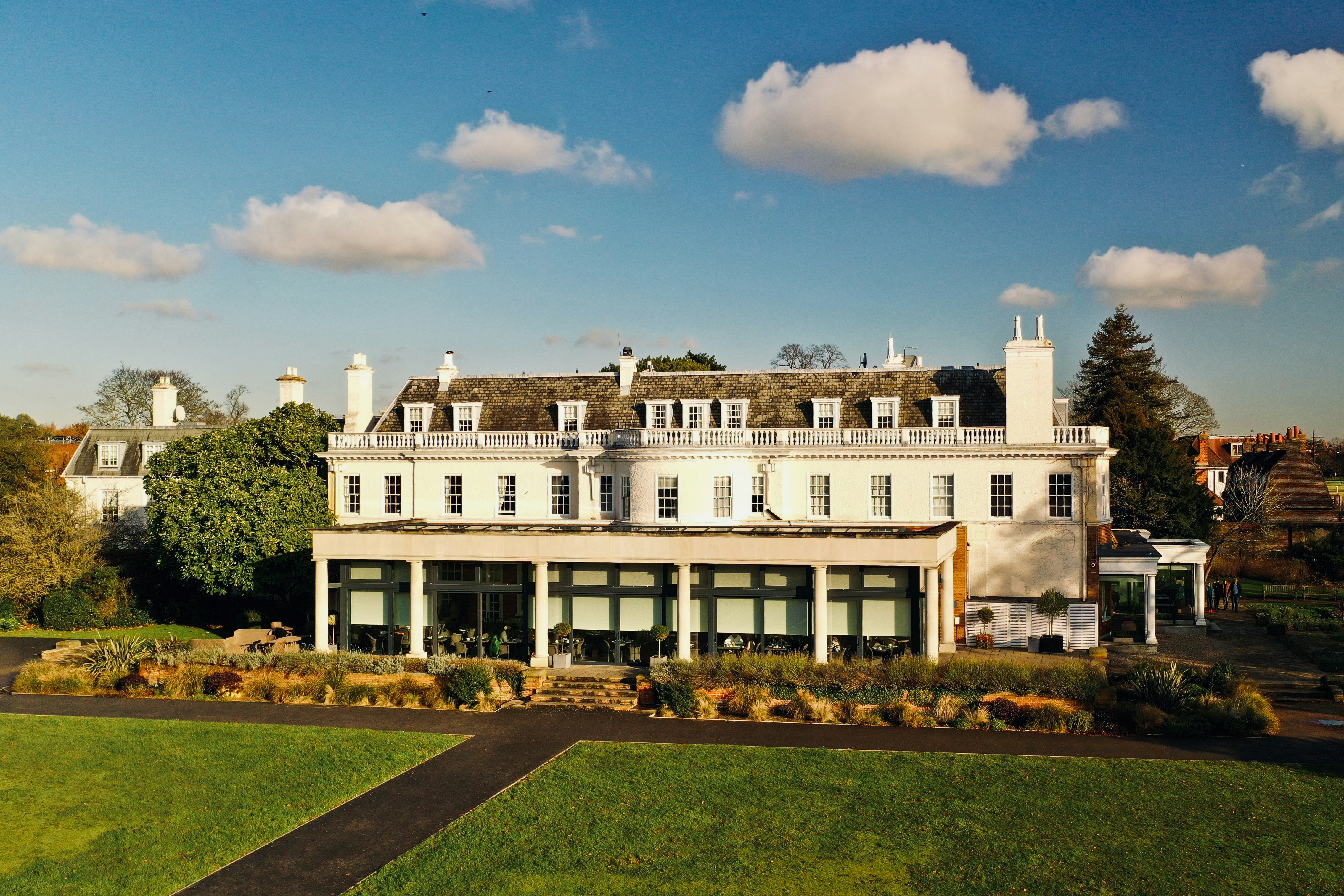 Boutique hotel in Wimbledon set beside green parkland, reflecting the area&rsquo;s quieter residential feel
